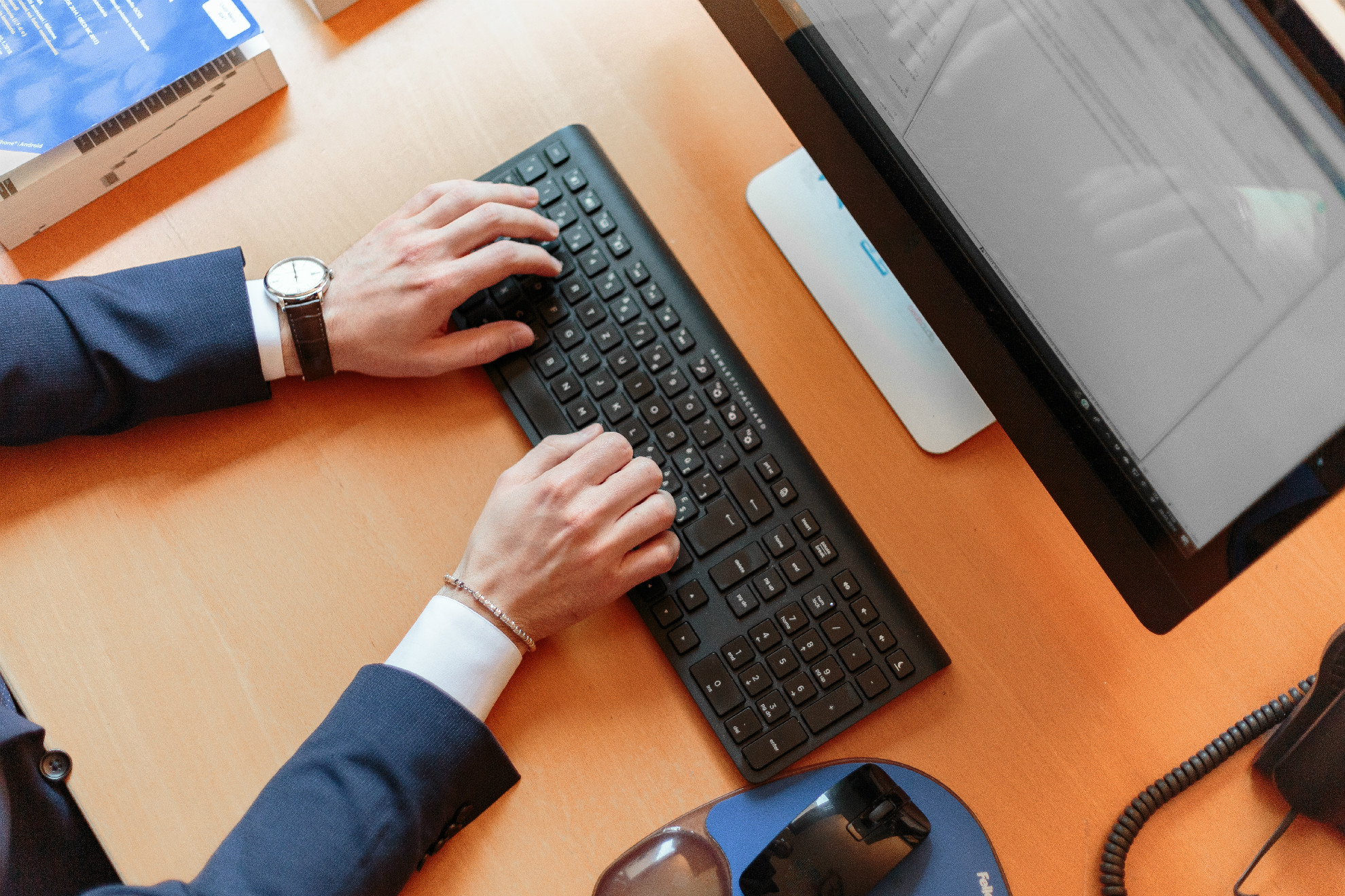 person-typing-on-computer-keyboard-2058128.jpg